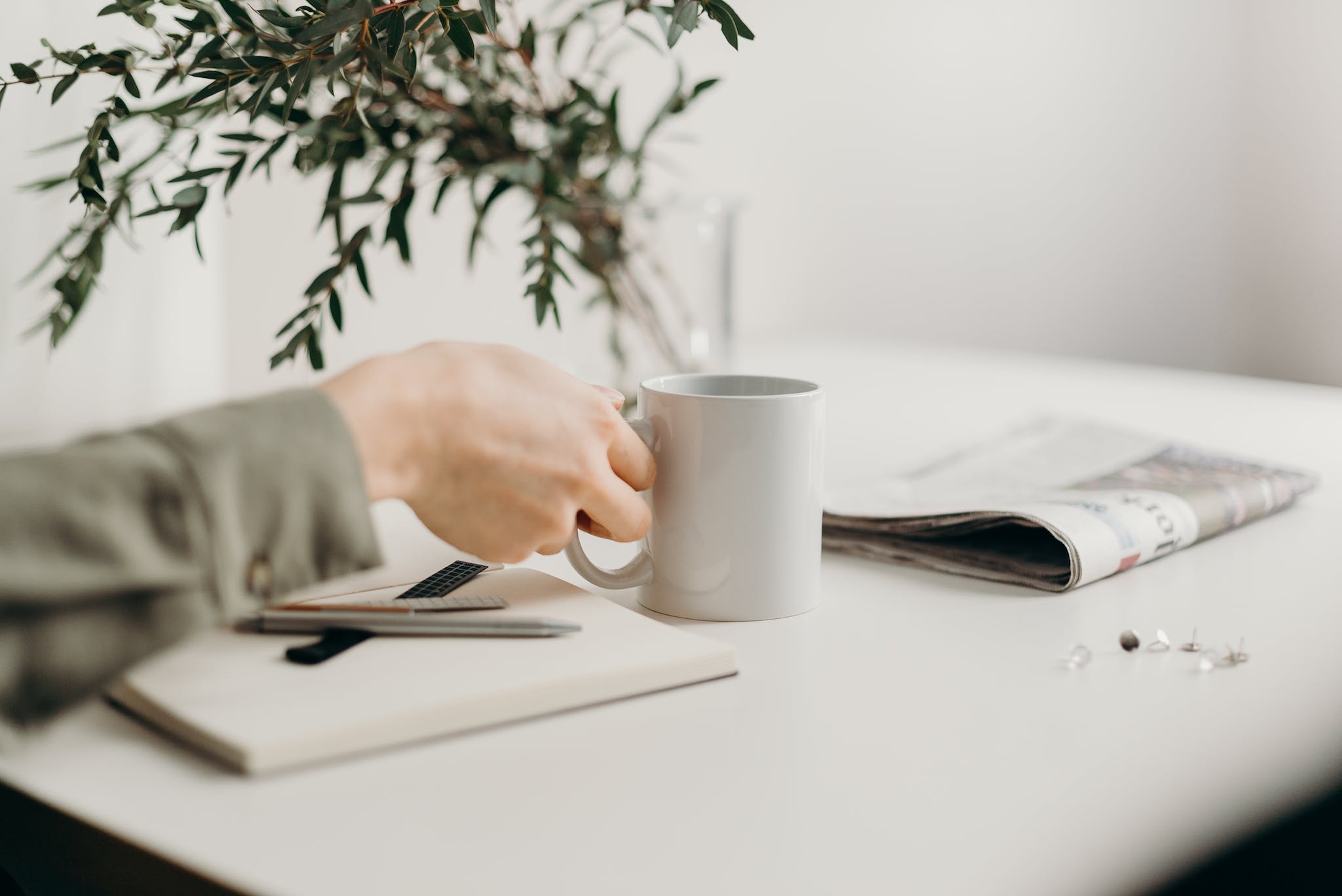Terms Of Use 1 Person Holding White Ceramic Mug
