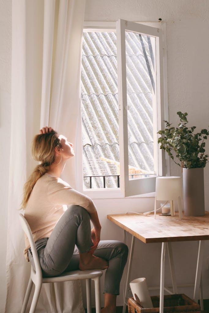 Mentoring 3 Woman Sitting on a Chair next to a Window